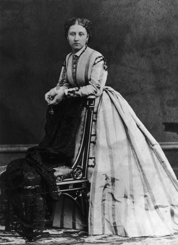 Princess Louise, the daughter of Queen Victoria resting against a chair