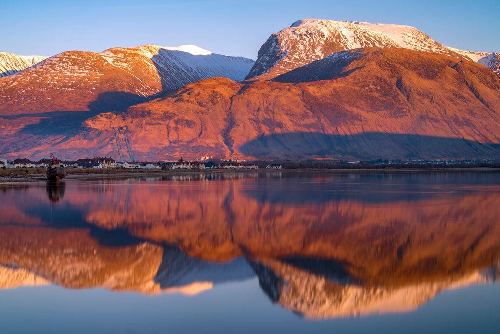 Last light on the famous Ben Nevis mountain with Loch Eilch.