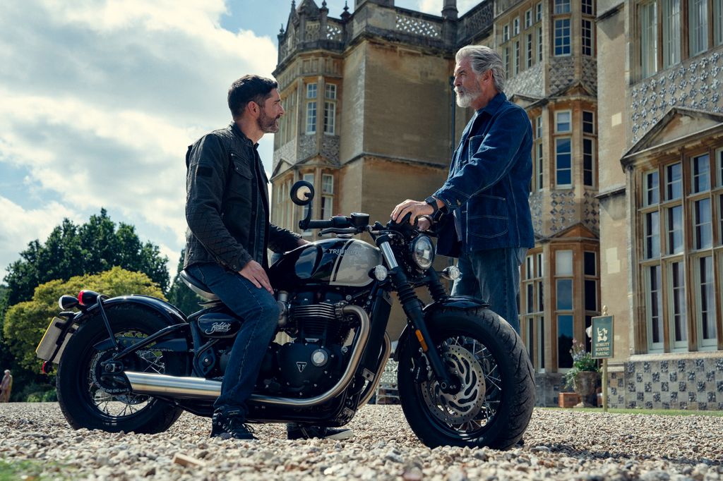 Tom Ellis and Pierce Brosnan filming The Thursday Murder Club outside Englefield House