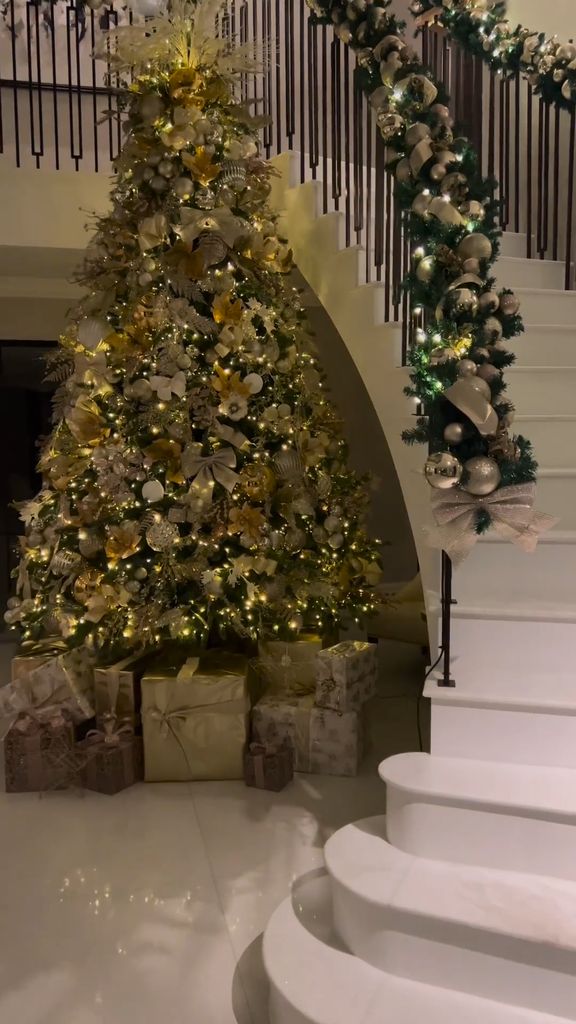 White stairs with Christmas tree