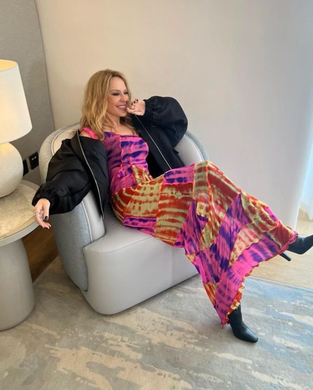 Kylie Minogue in a multicoloured dress