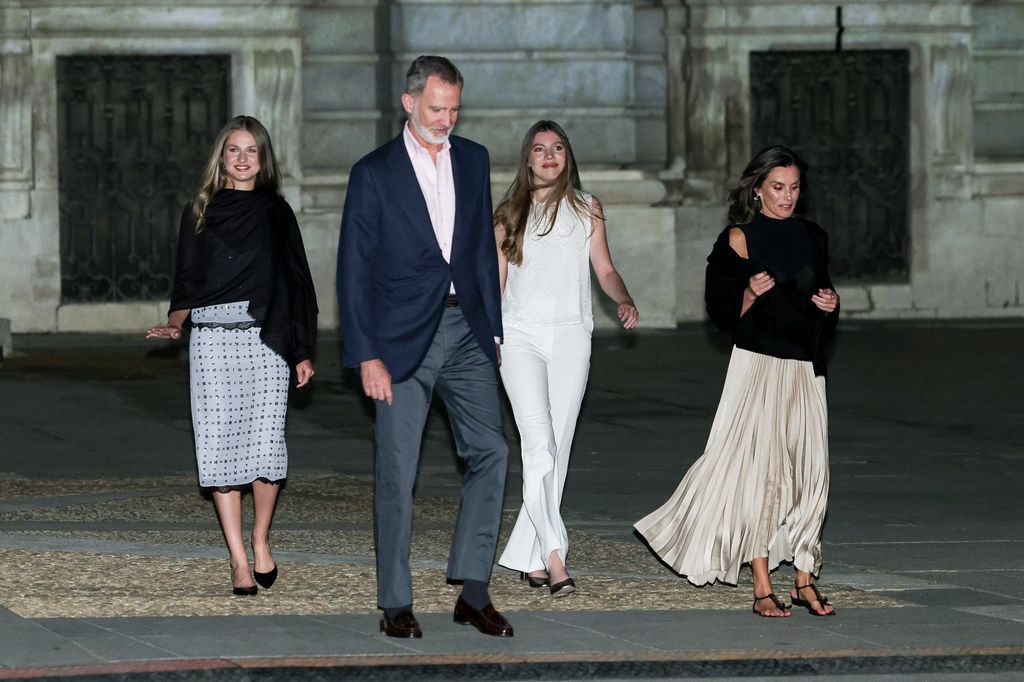 King Felipe, Queen Letizia, Crown Princess Leonor and Princess Sofia exiting concert