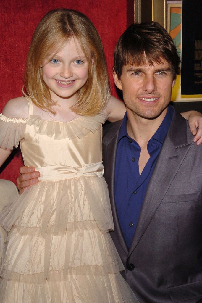 Dakota Fanning and Tom Cruise attend the U.S. Premiere of War of the Worlds