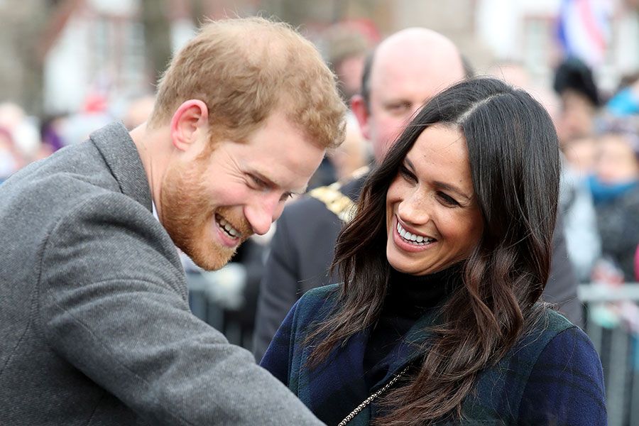 prince harry and meghan together smiling