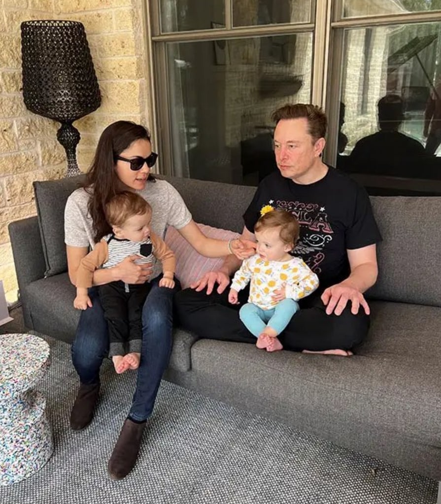 Photo posted by Elon Musk's biographer Walter Isaacson on Twitter September 6, 2023 of the Tesla founder with venture capitalist Shivon Zilis and their twins Strider and Azure, born in November 2021.