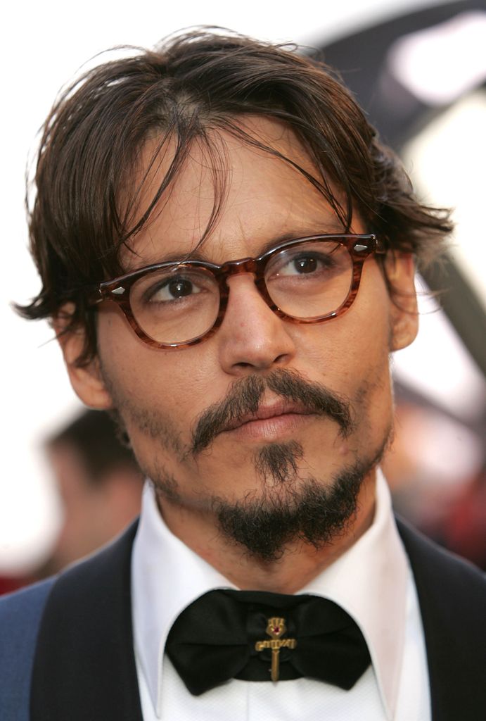 Johnny Depp: Depp’s mustache, part of his eclectic style, complements his trademark goatee and messy hair. The slightly untamed, Bohemian look became a staple for his persona, reflecting his free-spirited and unconventional Hollywood image.