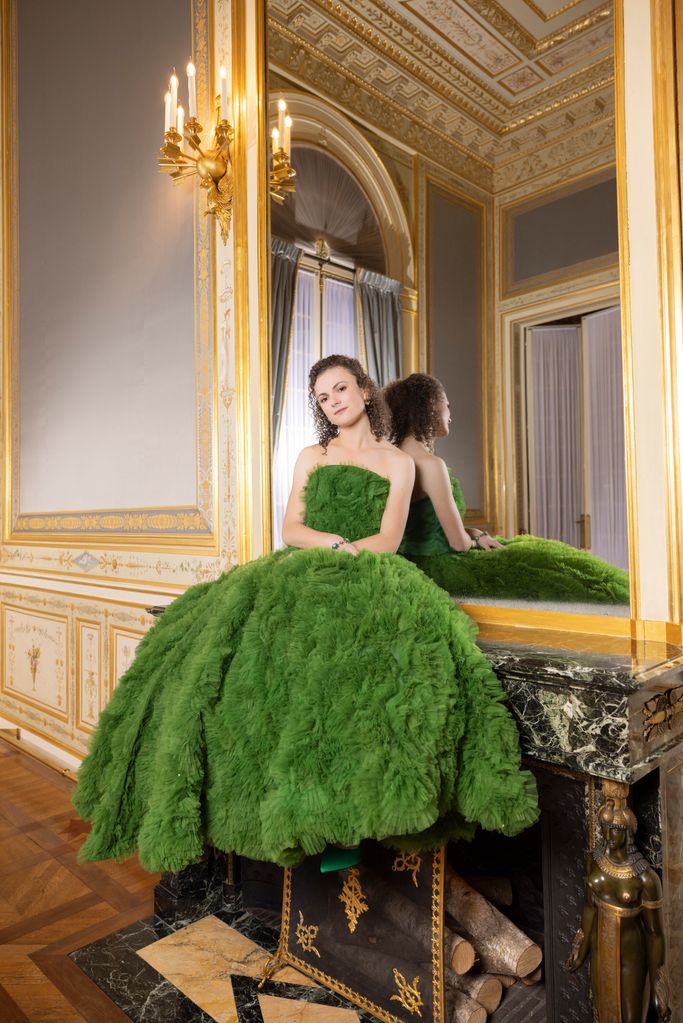 Eden Leprevost wears a green dress