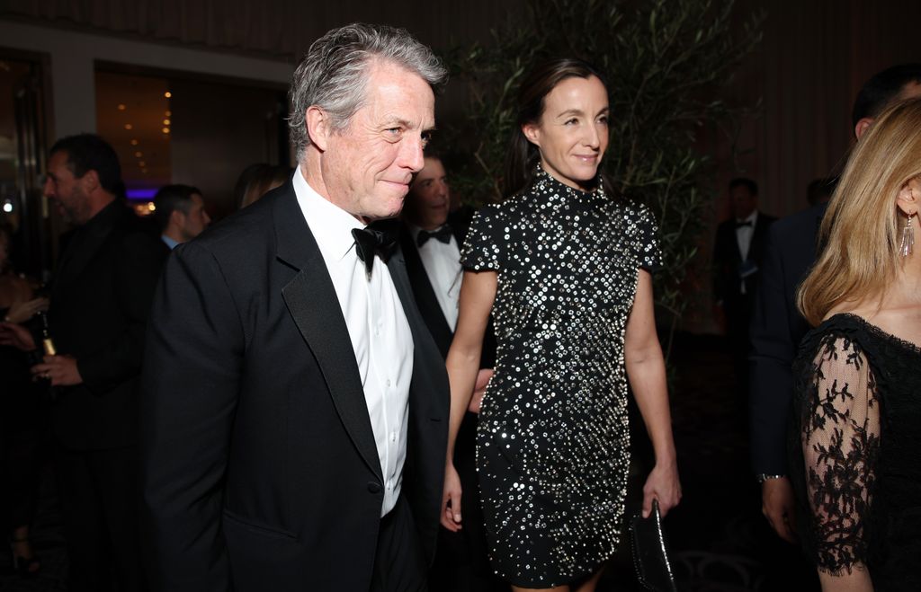 Hugh Grant and Anna Eberstein