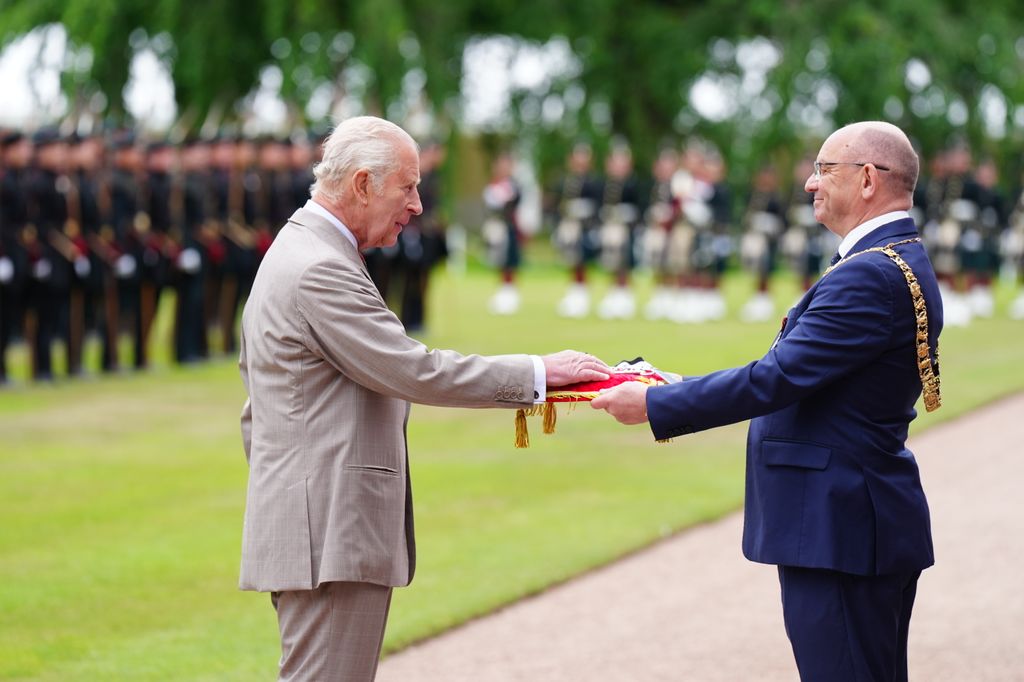 The Lord Provost of Edinburgh Robert Aldridge presents the keys to the City of Edinburgh to King Charles III 