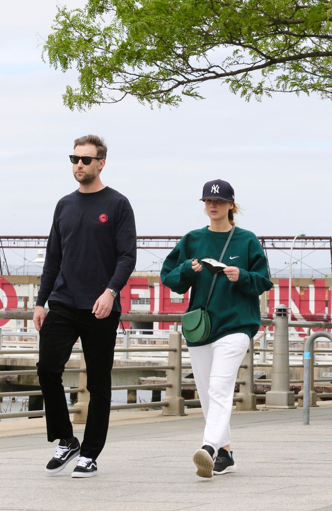 Jennifer Lawrence is seen out for a walk by the Hudson river with her husband Cooke Maroney on May 24, 2021 in New York City, New York