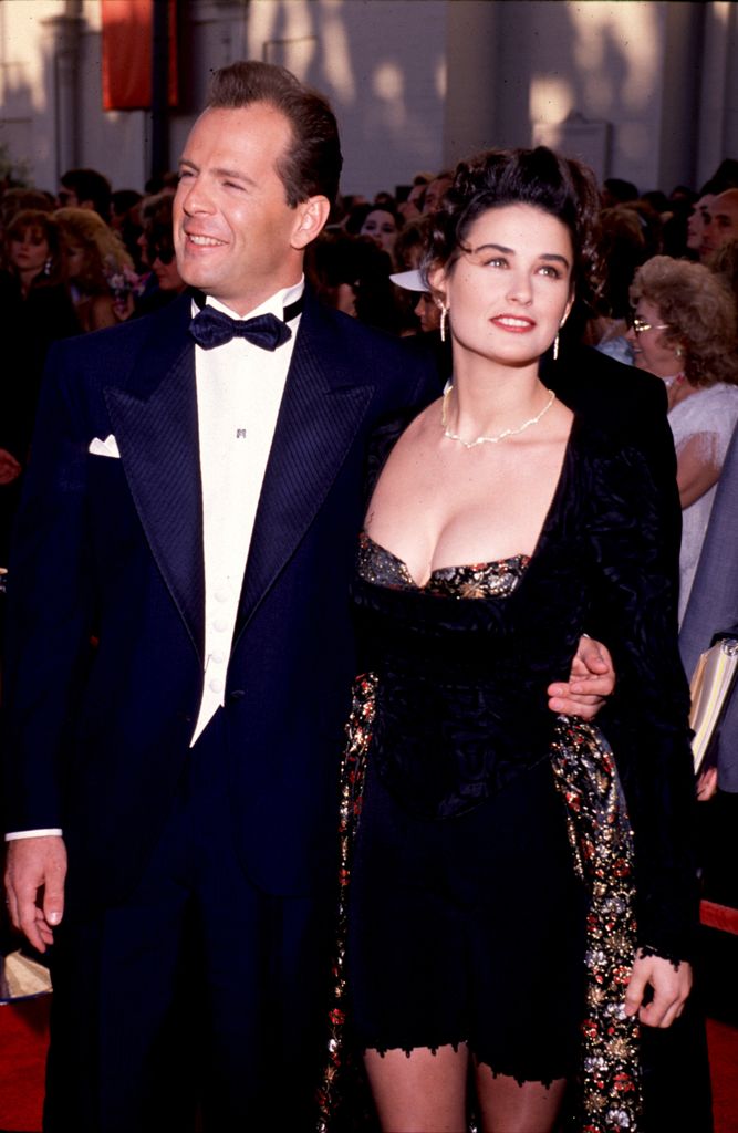 Bruce Willis & Demi Moore photographed at the Emmys at the Pasadena Civic Auditorium in Los Angeles, California (Photo by Ron Wolfson/WireImage) 1988