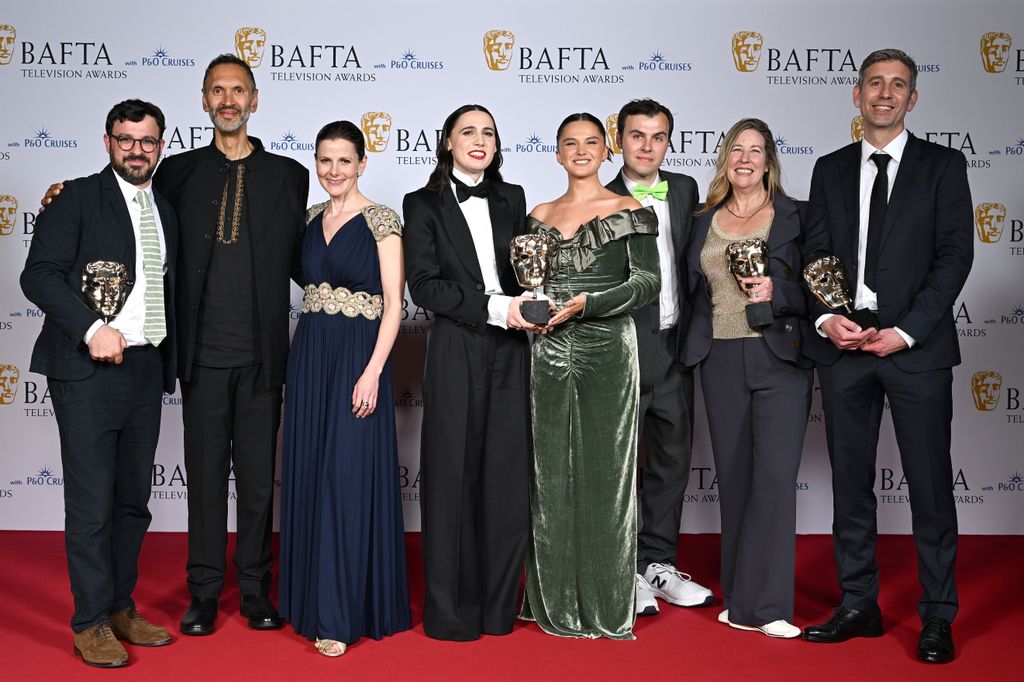 Simon Bird, Paul Bazely, Louise Brealey, Kat Sadler, Lizzie Davidson, Freddie Meredith, Catherine Gosling Fuller and Jack Bayles pose with the Award for Scripted Comedy for 'Such Brave Girls' 