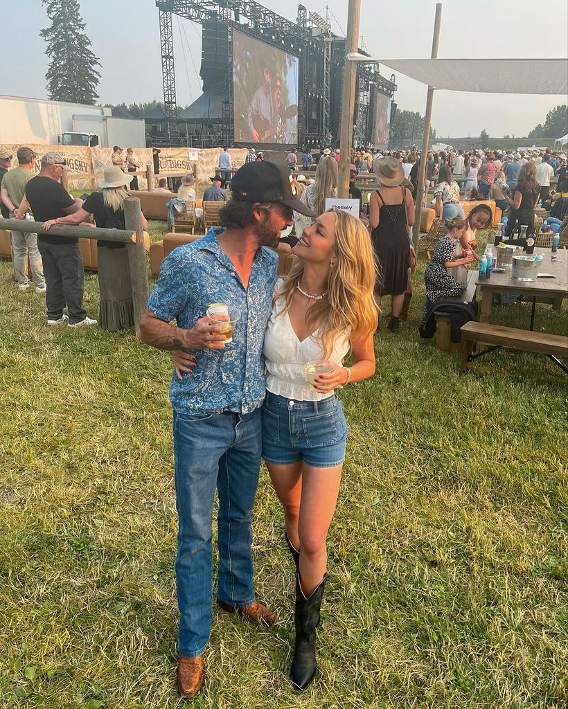 Ryan Bingham with Hassie Harrison at a concert 