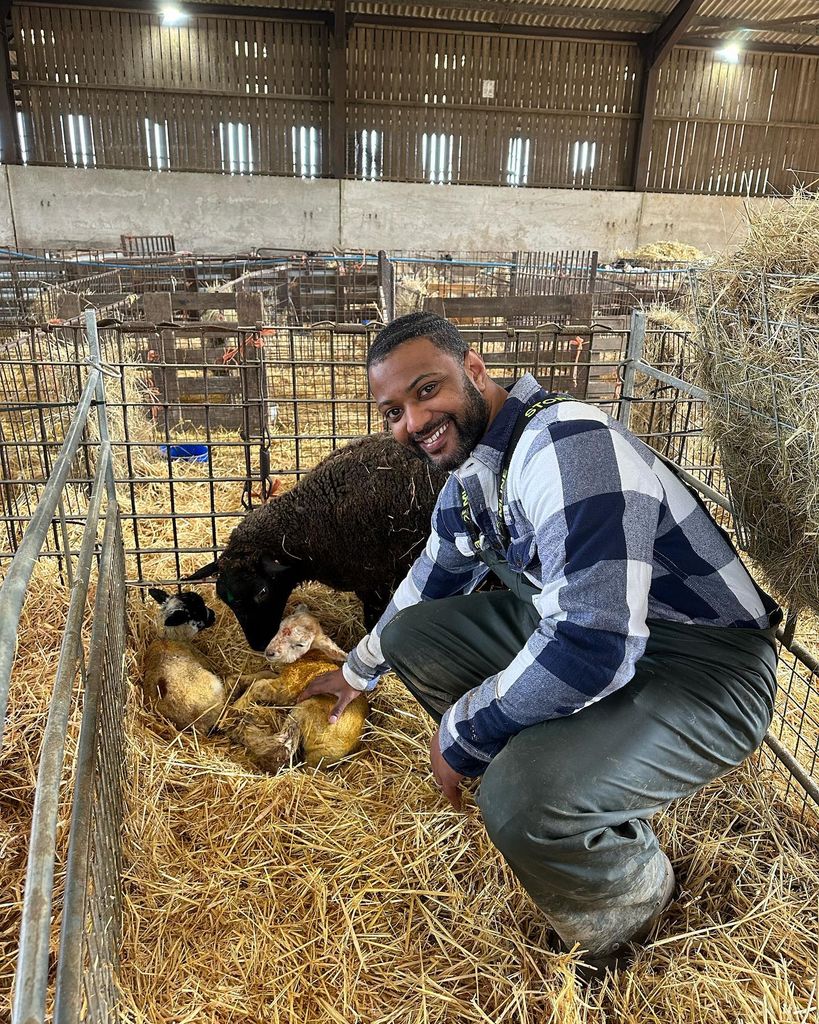 JB in barn with animals