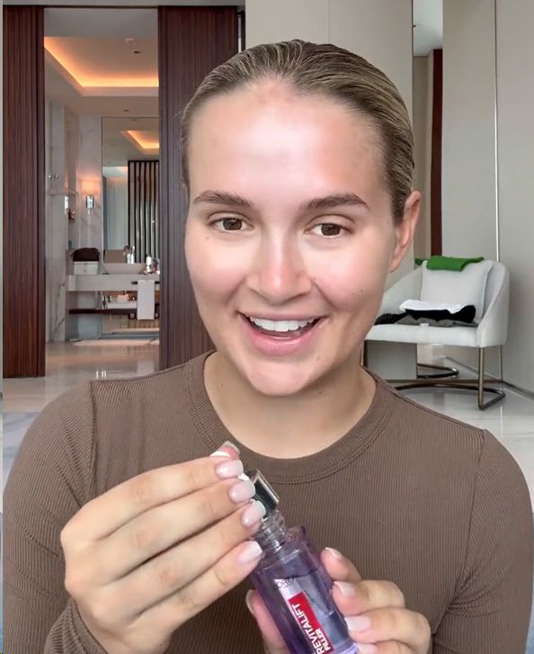 Molly-Mae applying L'Oreal Revitalift on TikTok