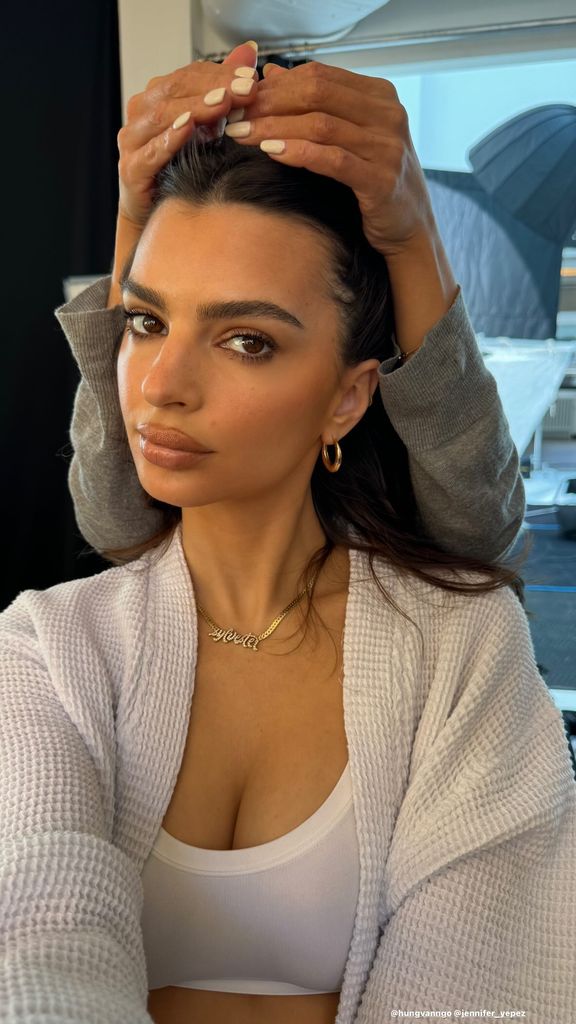 Emily Ratajkowski wearing a necklace with her son Sylvester's name on 