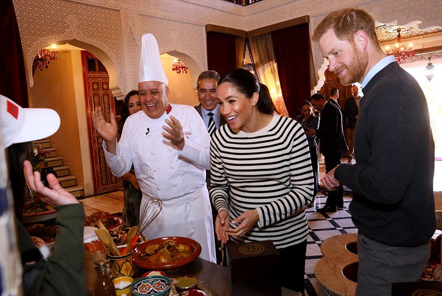 prince harry and meghan laughing at cooking demo
