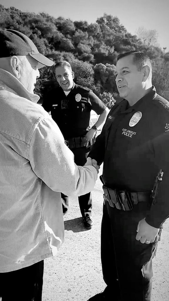 Bruce Willis interacts with first responders in Los Angeles, shared on Instagram