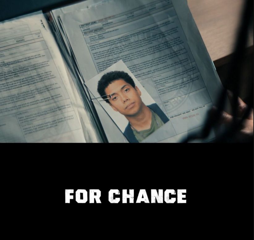 Still from Gen V featuring a photo of Chance Perdomo as Andre
