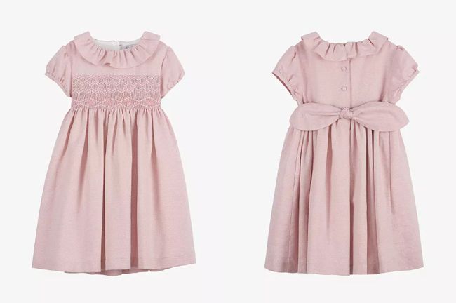 the front and back of a pink girls dress