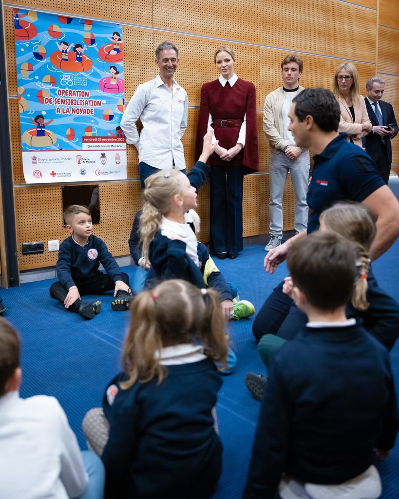 Princess Charlene in room of children having class