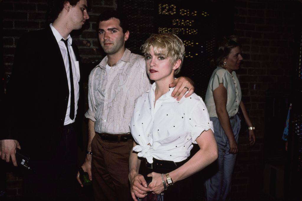 American singer Madonna with her half-brother Mario, circa 1995. 