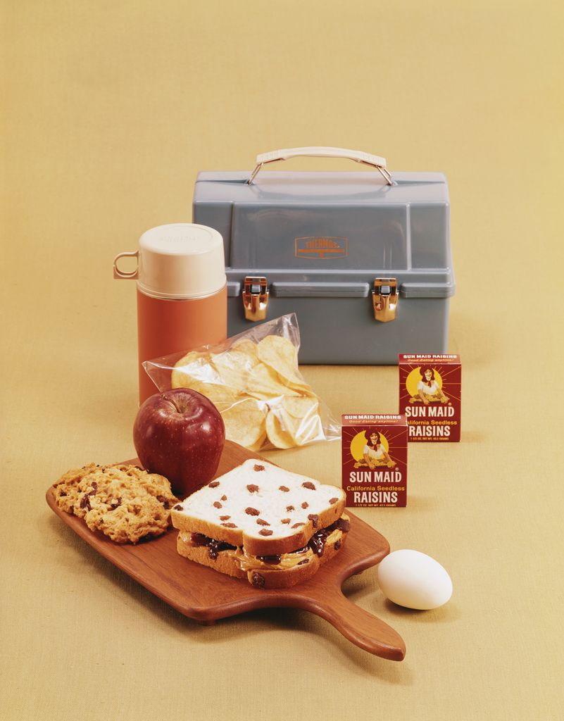 Sandwich with lunch box in background, close-up