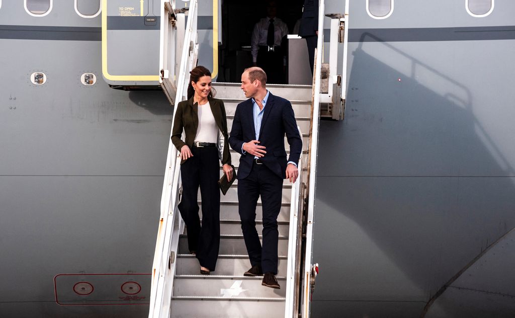 william and kate on plane steps