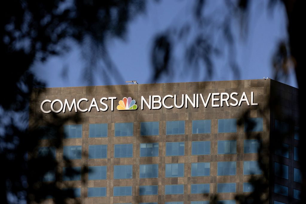 The Comcast NBCUniversal building is seen in Los Angeles, California, November 20, 2024. Comcast Corp. announced on November 20 it is breaking off its television assets to form a new, publicly traded company with its cable channels, including MSNBC, CNBC and USA Network, and also create a new corporate structure for NBCUniversal