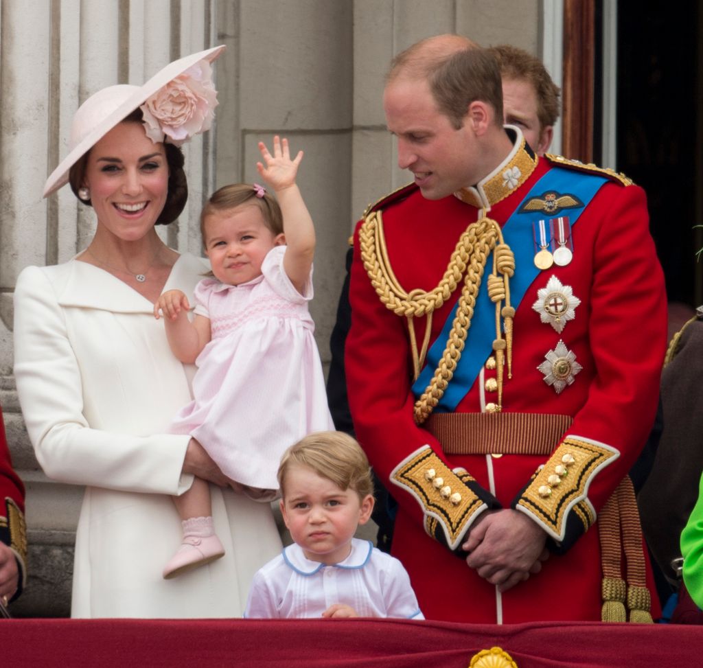 Princess Charlotte waving from palace balcony