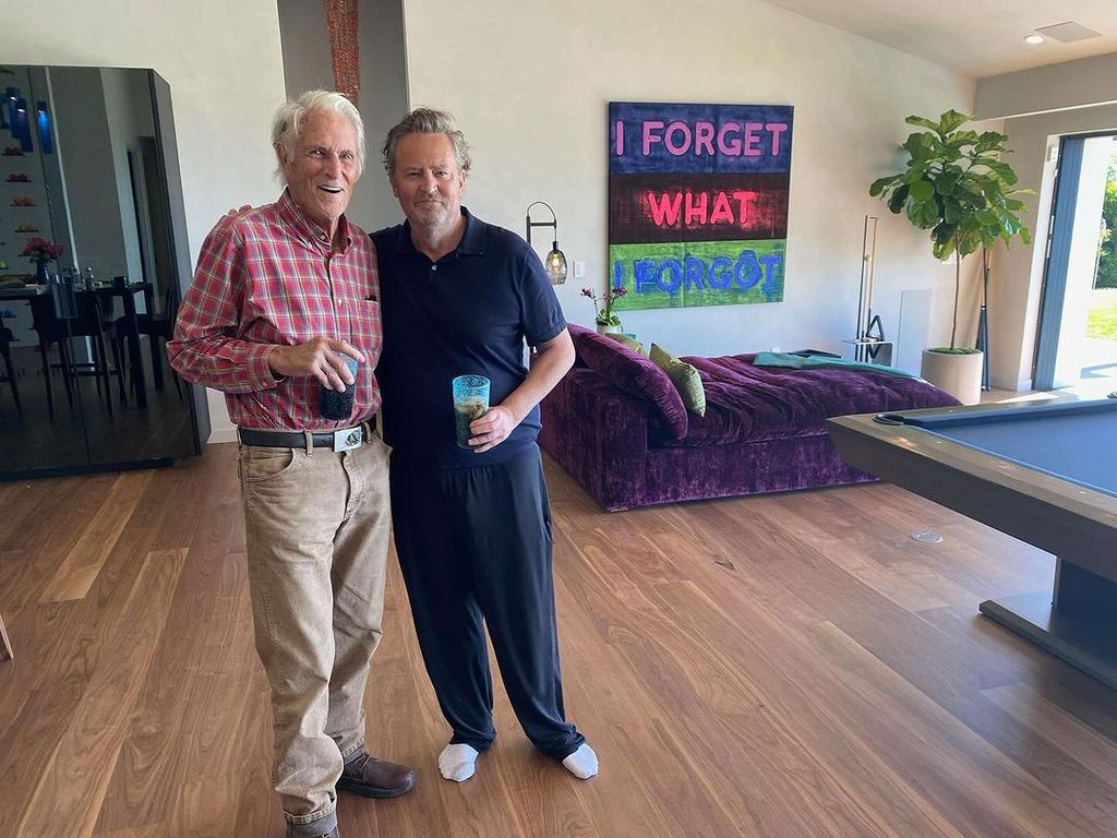 Matthew Perry poses with his father John Bennett Perry