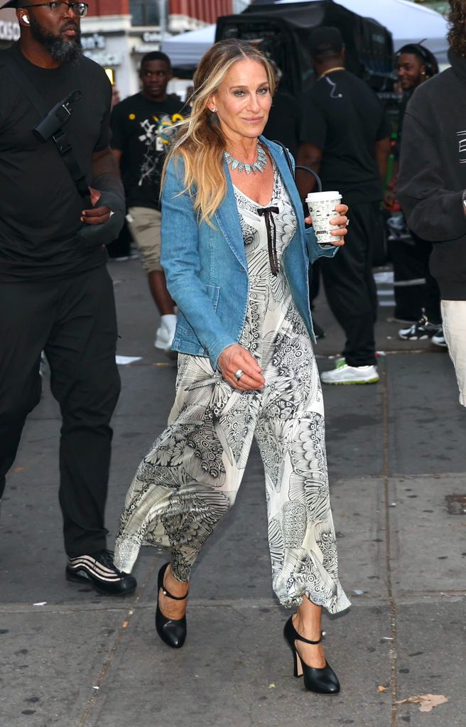 Sarah Jessica Parker is seen on film set of the 'And Just Like That' TV Series in denim jacket and jumpsuit