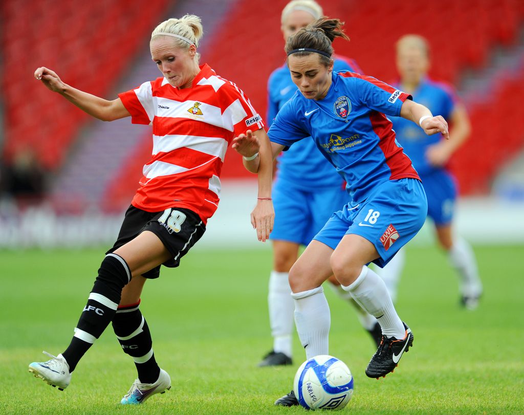 Julia Ralph Scott (L) of Doncaster and Alex Culvin of Bristol battle for the ball during the FA WSL match between Doncaster Rovers Belles Ladies FC and Bristol Academy Ladies FC at the Keepmoat Stadium on August 6 2011 in Doncaster