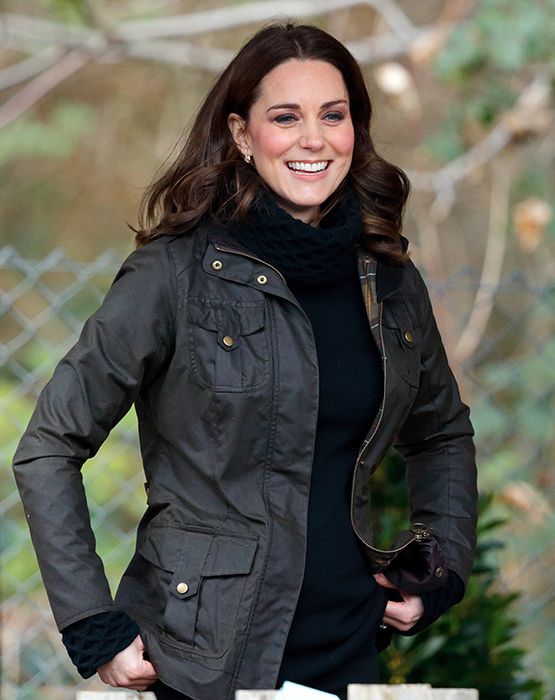 kate middleton visits primary school in wax jacket