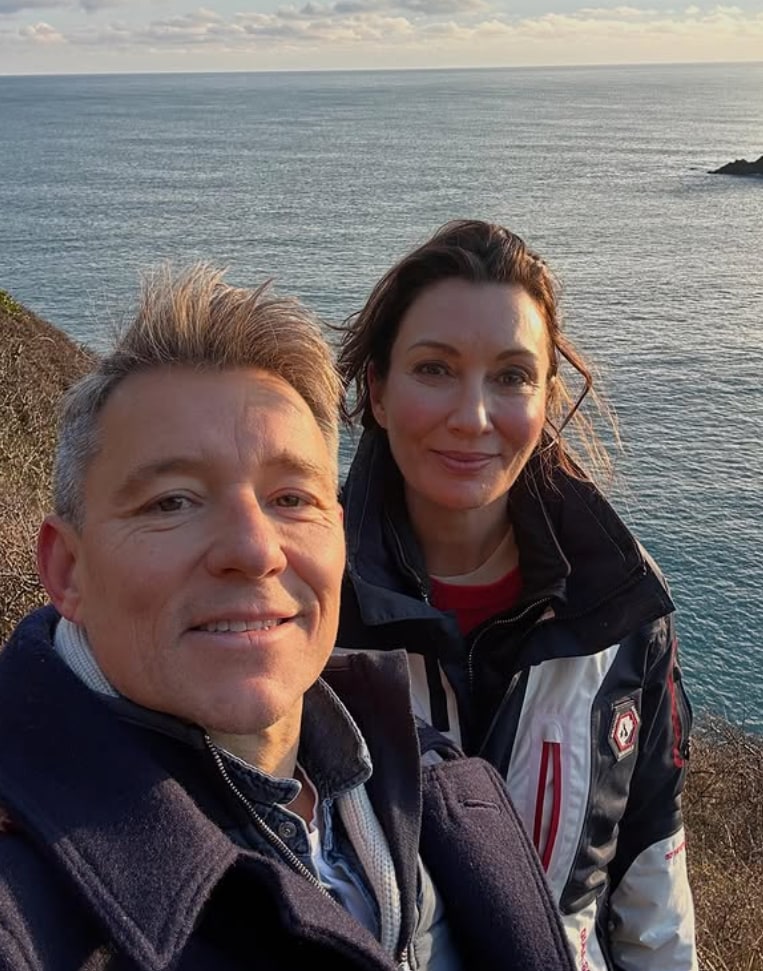 Ben and his wife Annie Shepard are on a beach 