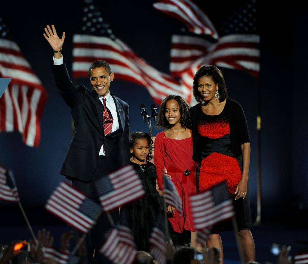 Barack Obama takes the stage, with his daughters Sasha and Malia and wife Michelle at his side to celebrate his presidential win, at Grant Park in Chicago, Illinois, on Tuesday, November 4, 2008. 