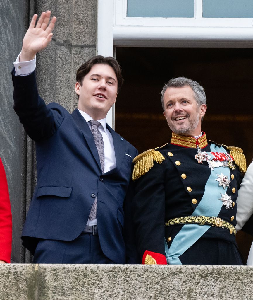 Crown Prince Christian waving alongside King Frederik