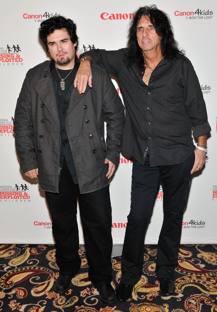 LAS VEGAS - JANUARY 08: Musician Dash Cooper (L) with his musician father Alice Cooper arrive at the Canon U.S.A. and National Center for Missing & Exploited Children's 11th Annual Canon U.S.A Customer Appreciation Red Carpet Reception at the Bellagio on January 8, 2010 in Las Vegas, Nevada.  (Photo by David Becker/Getty Images)