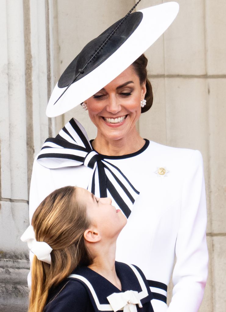 Princess Charlotte looking up at mum Kate Middleton