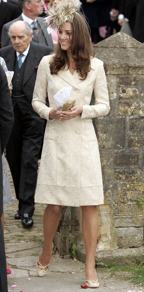 Kate Middleton in a cream coat dress at the wedding of Laura Parker Bowles & Harry Lopes