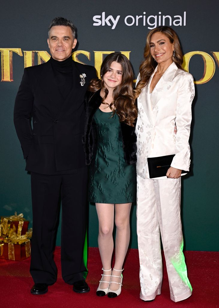 Robbie Williams, Teddy Williams and Ayda Field Williams attend the "Tinsel Town" World Premiere at Vue Leicester Square on November 27, 2025 in London, England