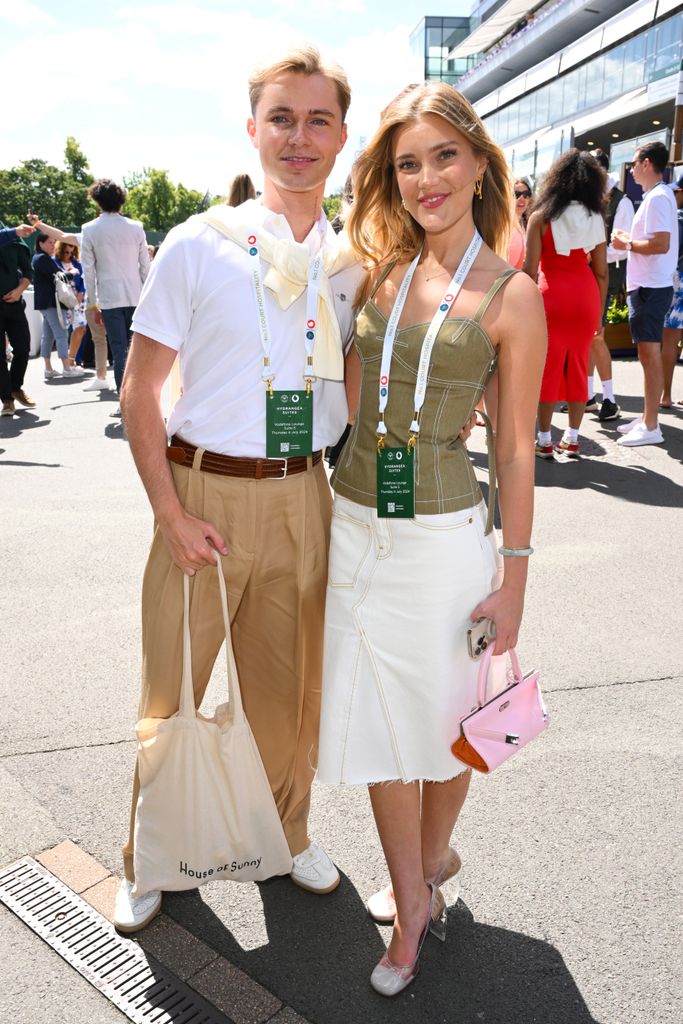 HRVY and Mimi Slinger attend day four of the Wimbledon Tennis Championships at the All England Lawn Tennis and Croquet Club 