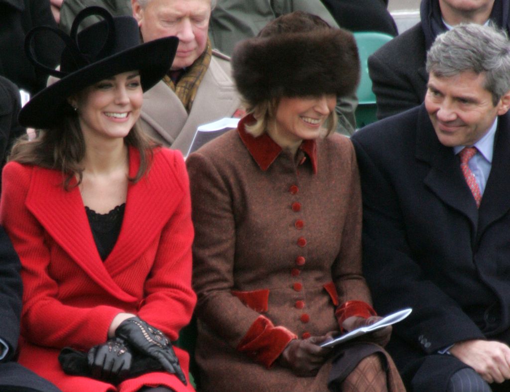 Kate and her parents sharing a giggle at Sandhurst