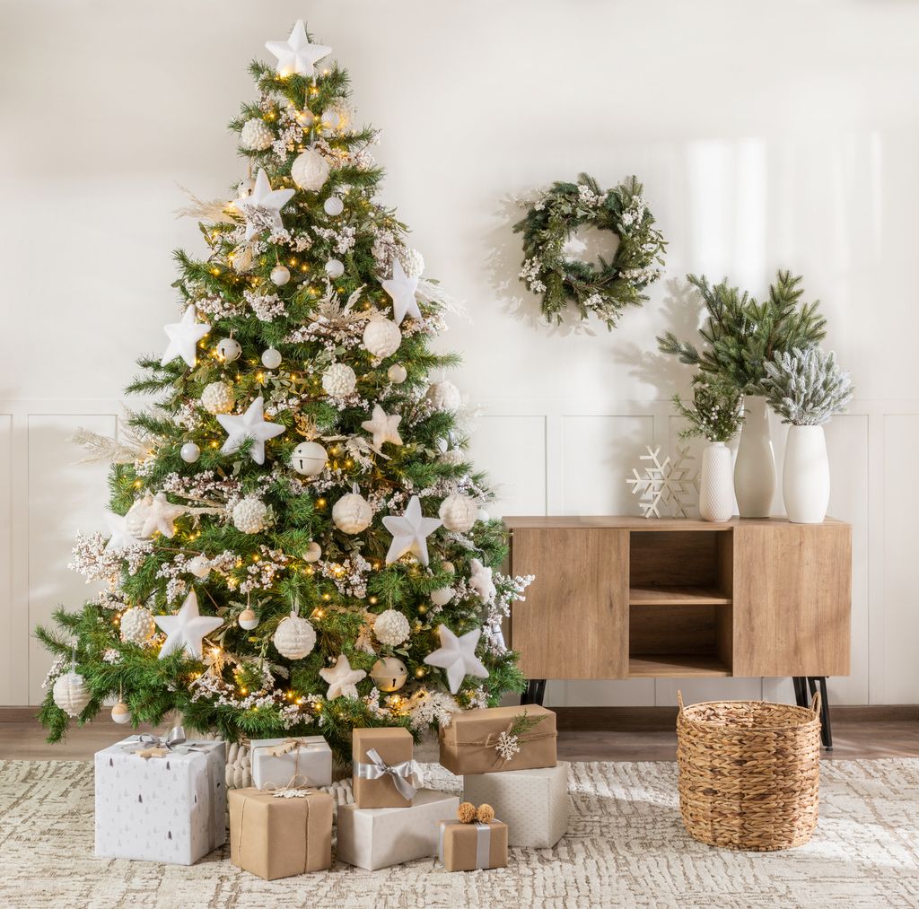 christmas tree with presents in modern lounge