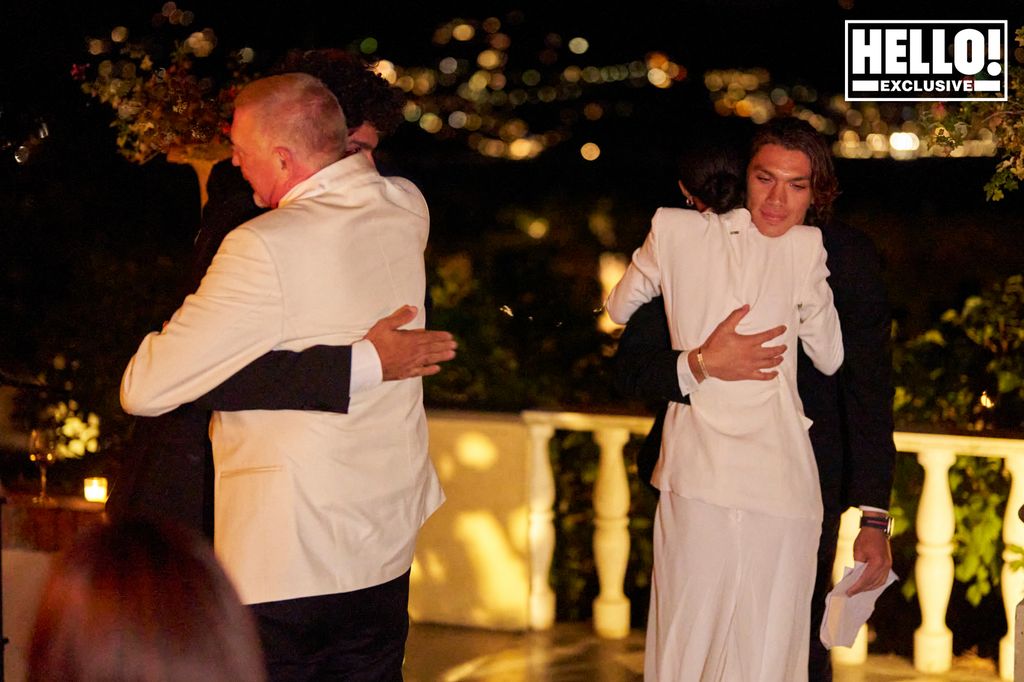 Boris Becker and his wife hugging his sons