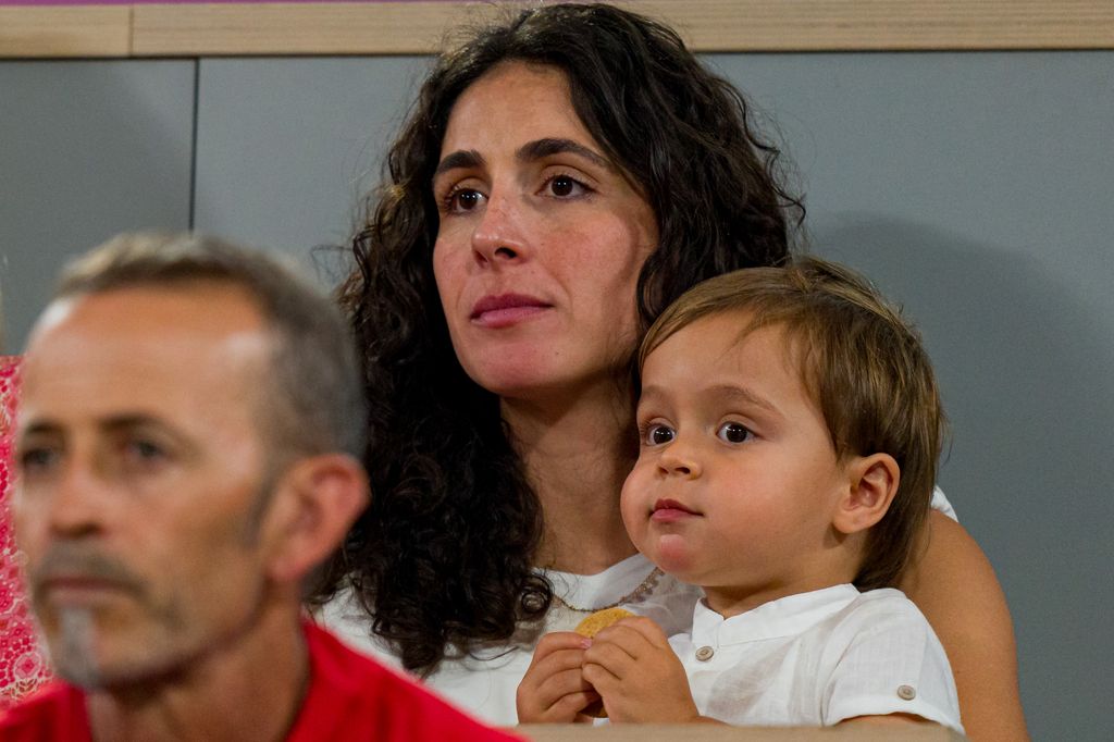 Maria Francisca Perello, wife of Rafael Nadal with their son Rafael Nadal Junior support Rafael Nadal and partner Carlos Alcaraz of Spain against Andres Molteni and Maximo Gonzalez of Argentina in the Men's Doubles first round match on day one of the Olympic Games Paris 2024