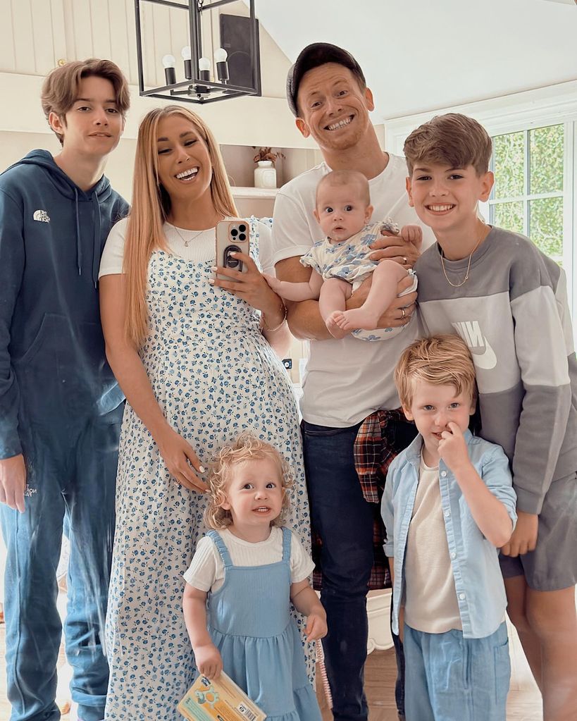 Stacey in selfie with Joe and five kids