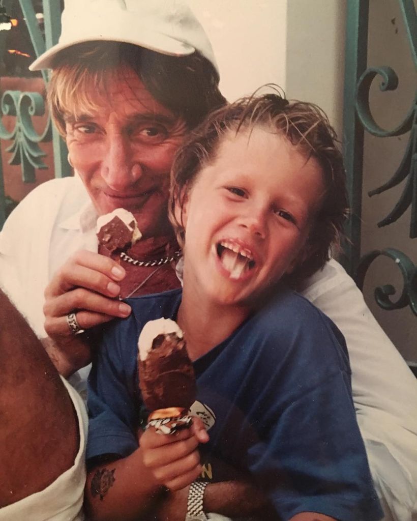 Liam in childhood snap with Rod 