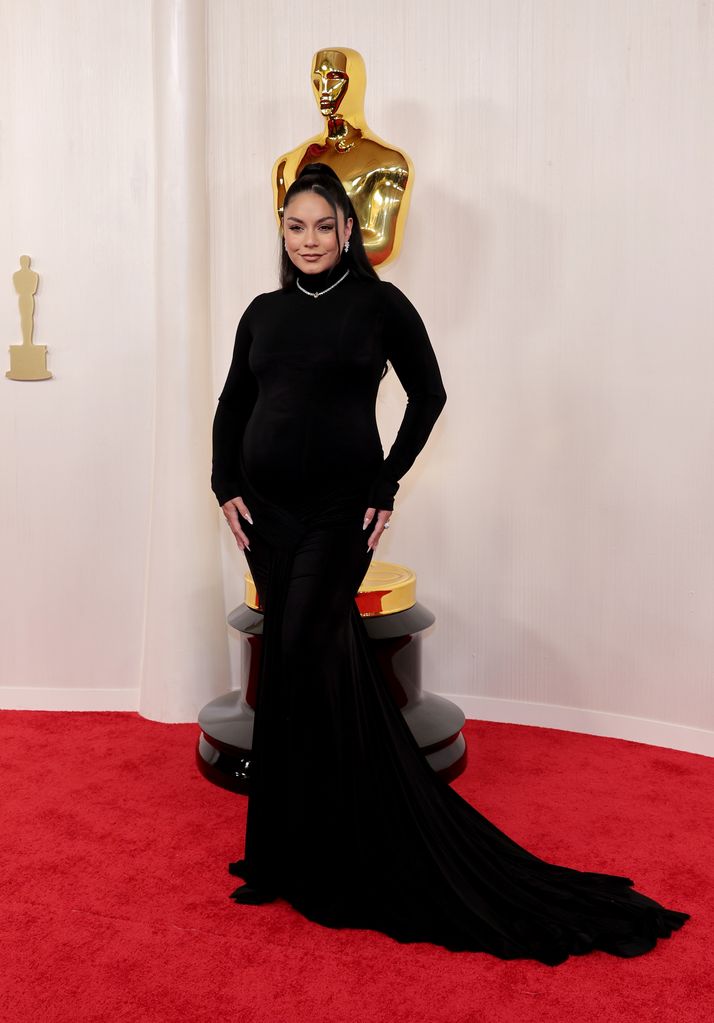 Vanessa Hudgens showing off baby bump in black dress at Oscars