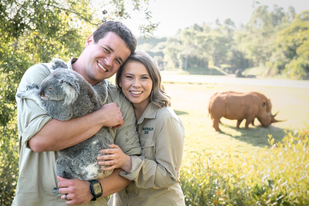 Bindi Irwin and her husband Chandler cuddle a koala at Australia Zoo